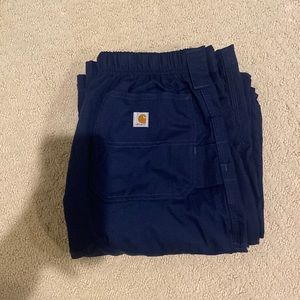 Men’s cargo pants but women can wear them too! CARHARTT 🧡